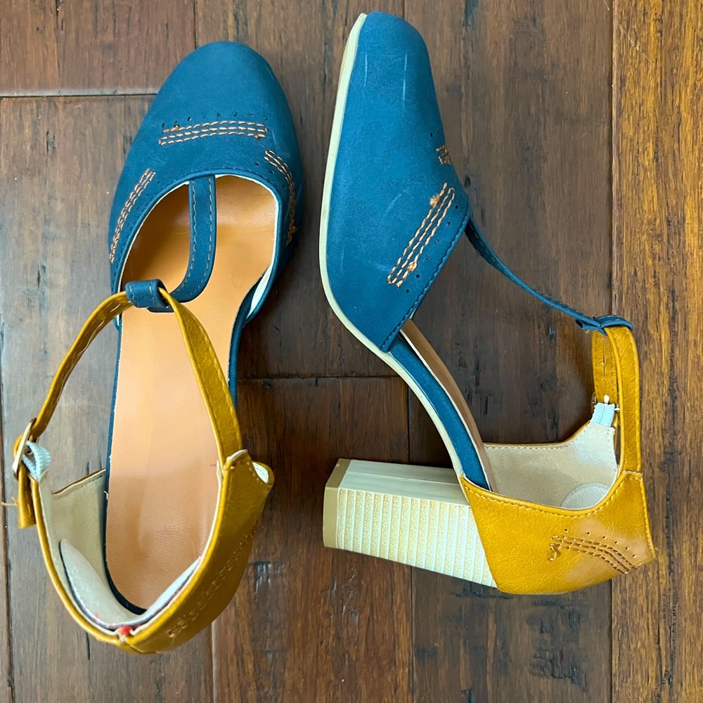 Blue and tan leather heels. Size 8 US, 39 European. Couple scuffs. Barely worn.